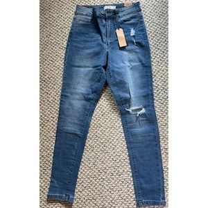 Size 9 Fashion skinny Jean for women, new with tags, slight stretch